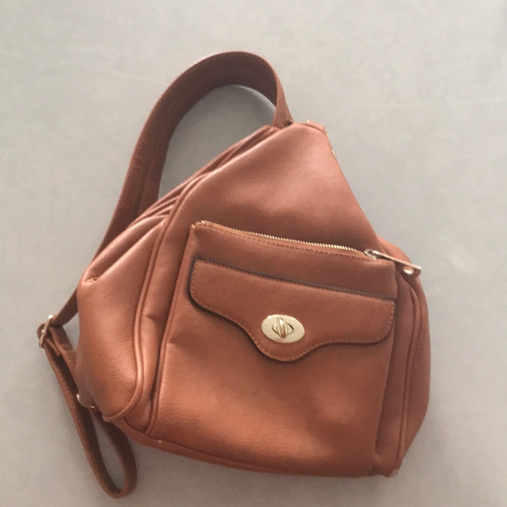 Brown/gold leather like Sling purse small backpack